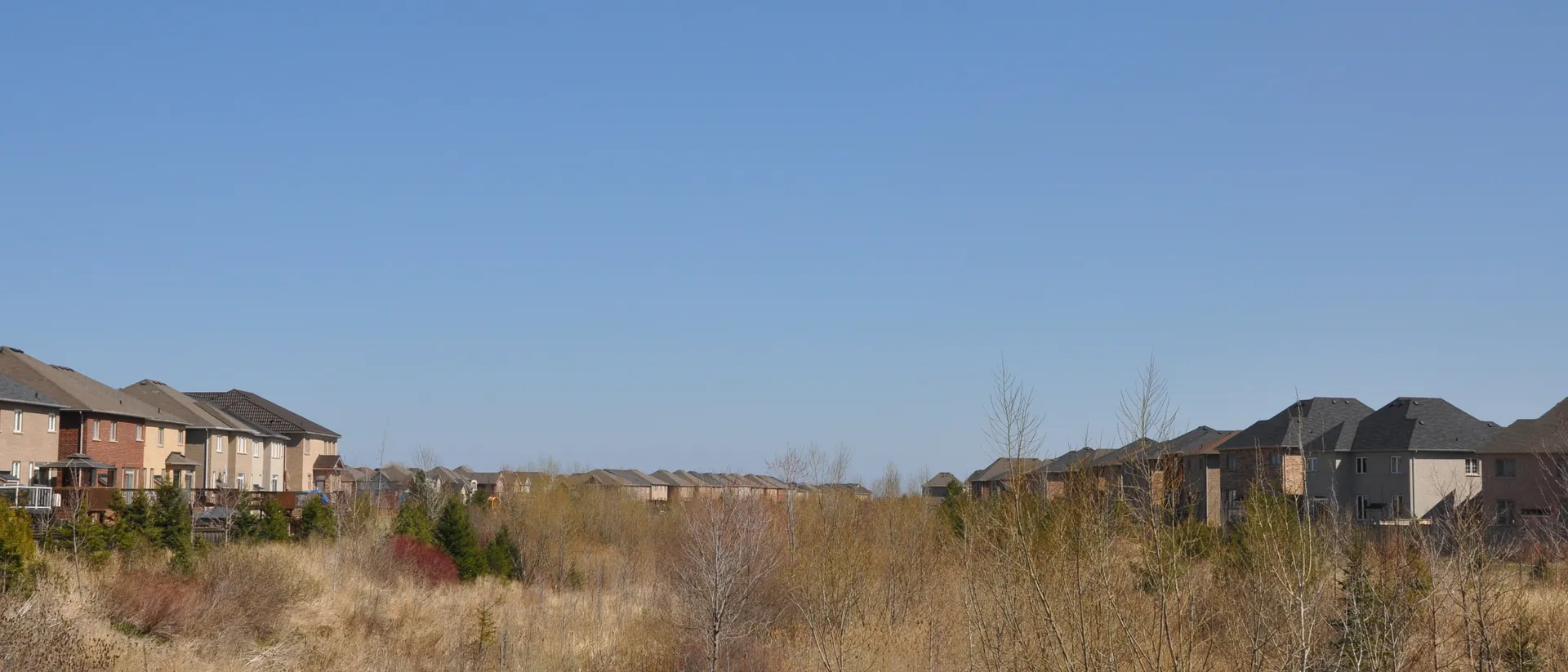 Residential street and Fourteen Mile Creek in northwest Oakville